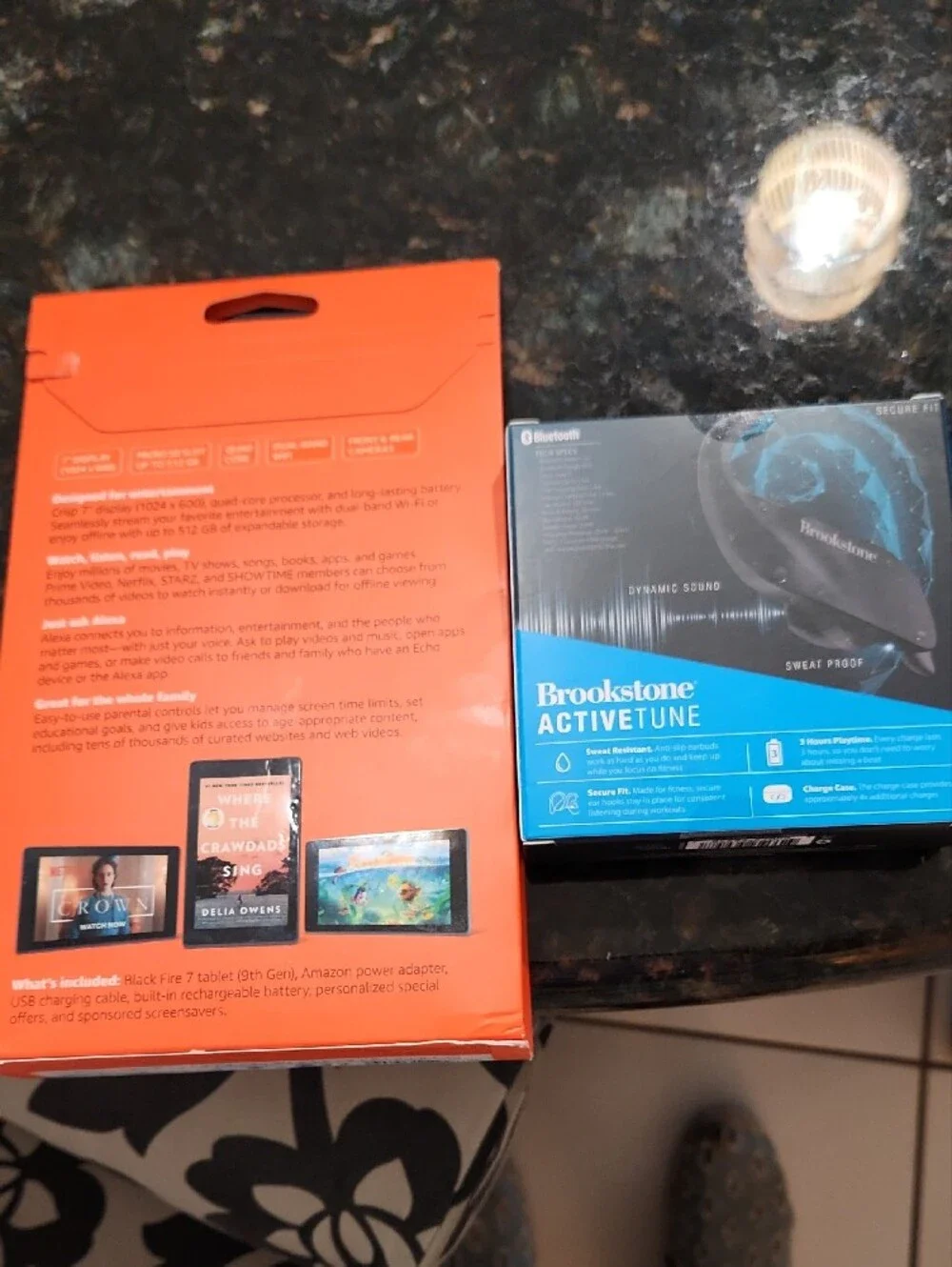 BOTH Fire 7 And Brookstone Earbuds Both Unopened